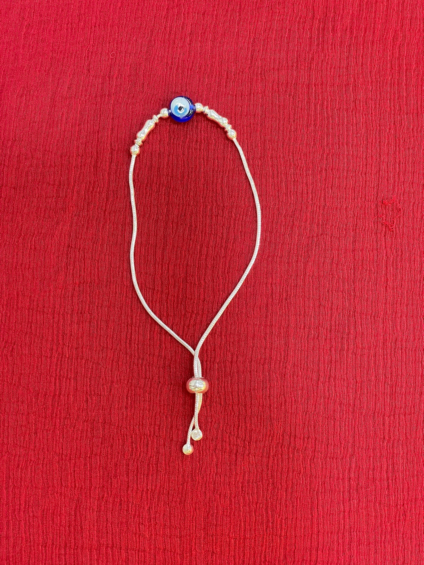 92.5 Silver Evil Eye Adjustable Bracelet for Women | Blue Bead & Silver Charm Design