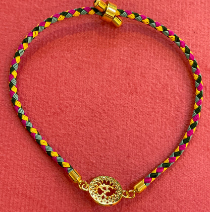 Silver Om Rakhi for Brother | Gold Plated Om Charm with Multicolour Braided Thread