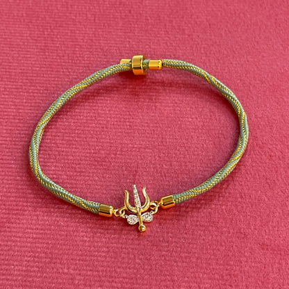 Silver Trishul Rakhi for Brother | Gold Plated Trishul Charm with CZ Stones on Mint Green Thread