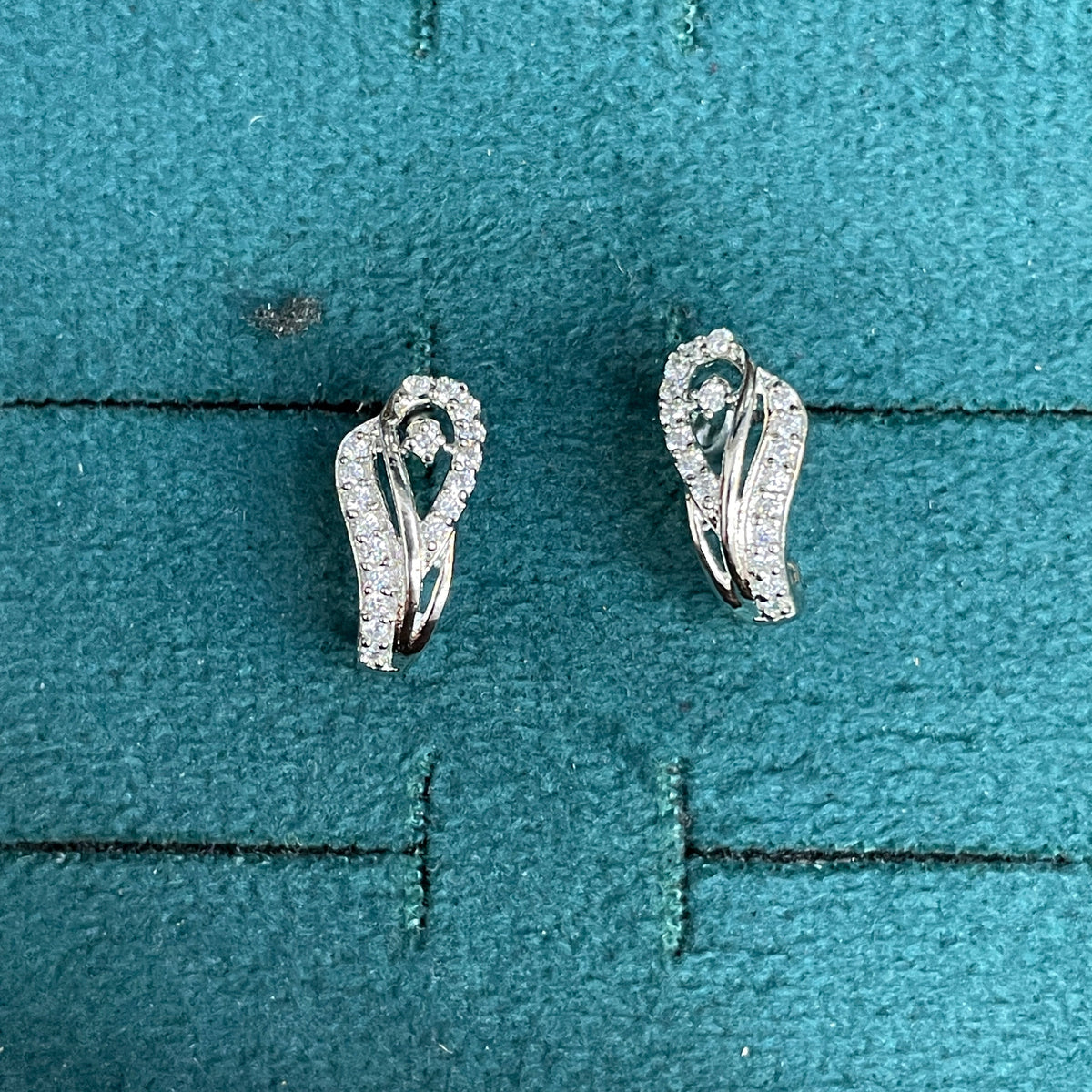 92.5 Sterling Silver CZ Sweeping Loop Teardrop J Studs pair