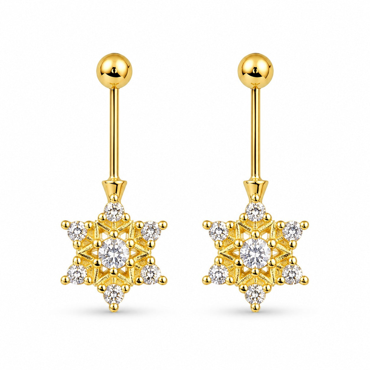 Gold star-shaped bugadi 
earrings with clear gemstones on a white background