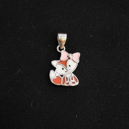 Silver and red butterfly charm on a maroon fabric background