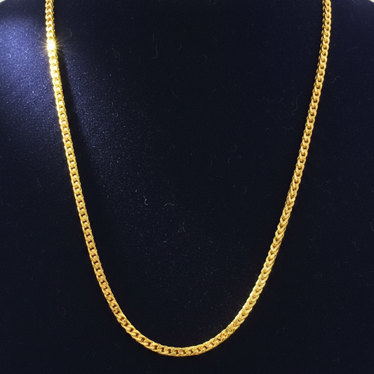 Red fabric with a gold chain detail
