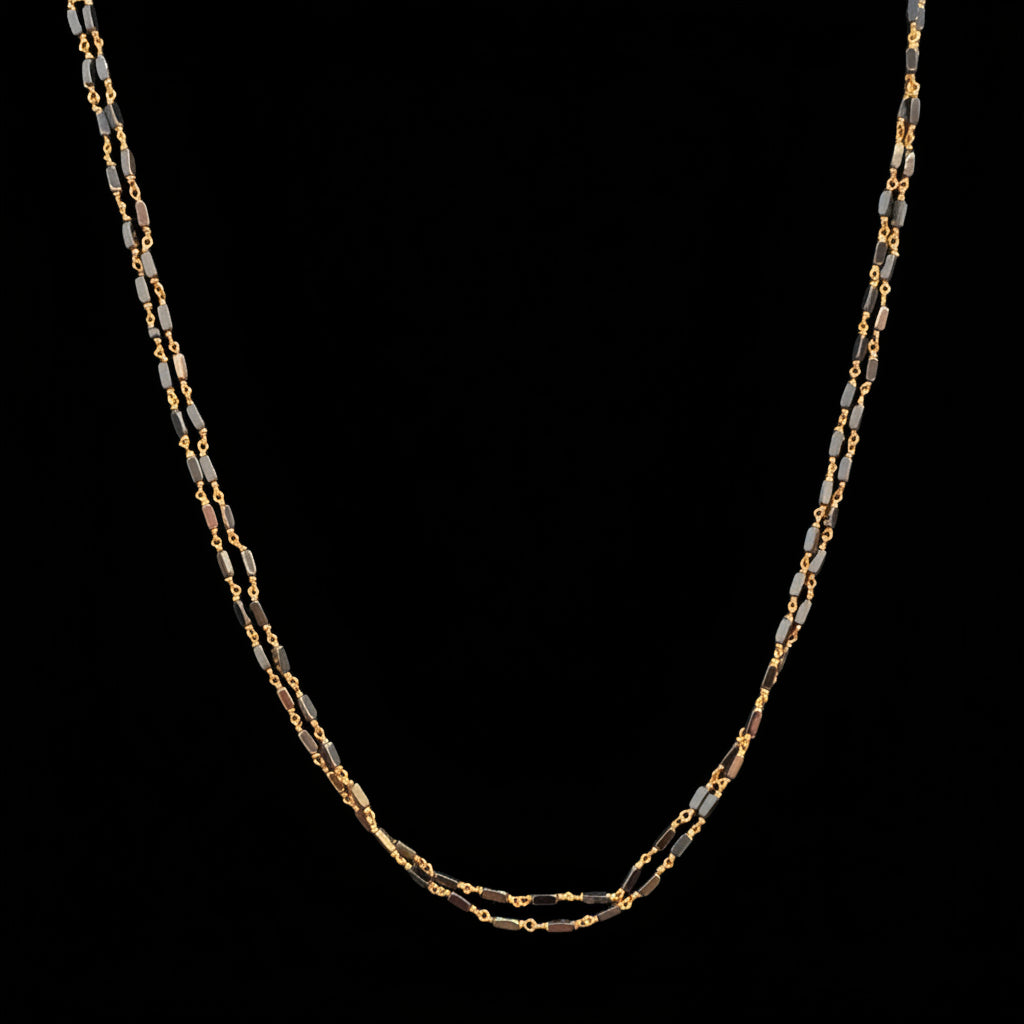 Gold chain on a red fabric background