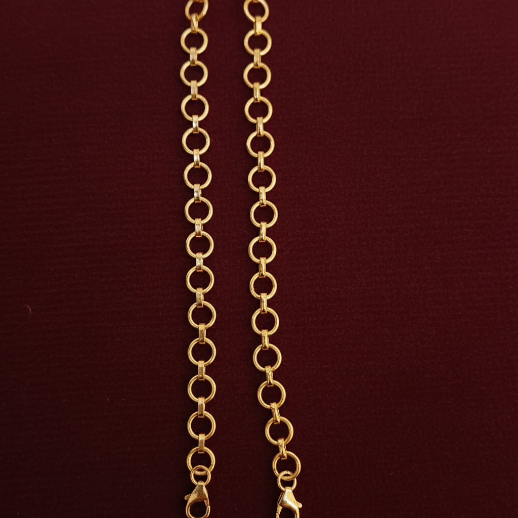 Gold chain with a tag on a red textured background