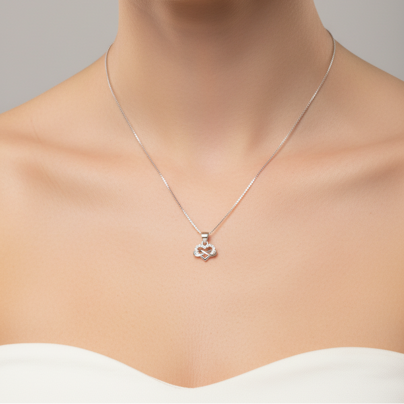 Necklace with a pendant worn by a model on a neutral background