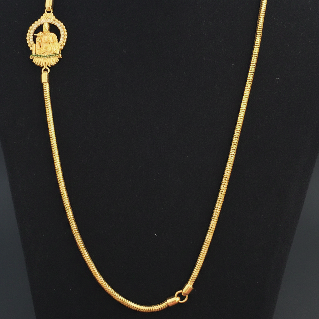 Gold necklace on a red fabric background