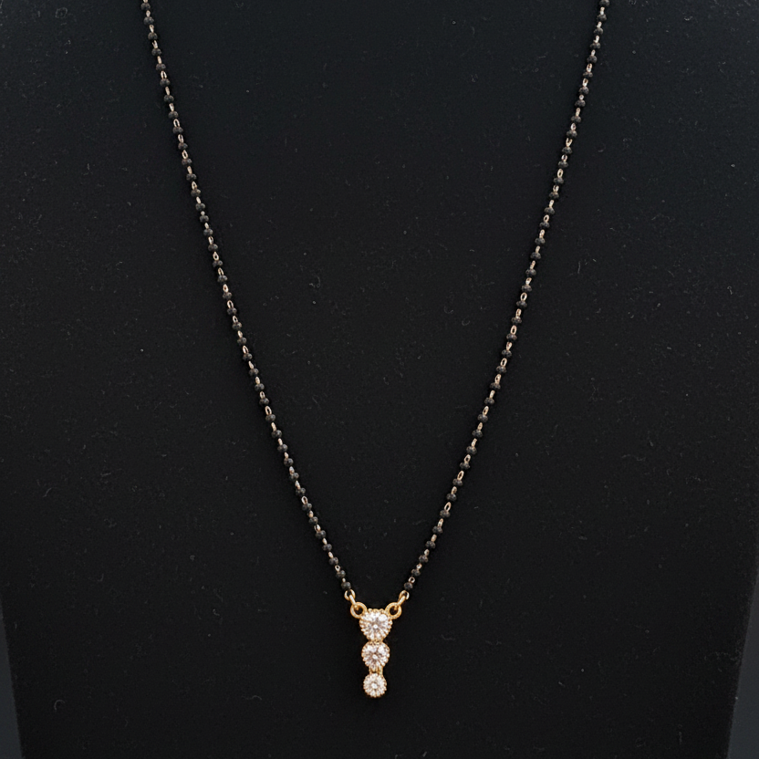 Necklace with a pendant on a red fabric background