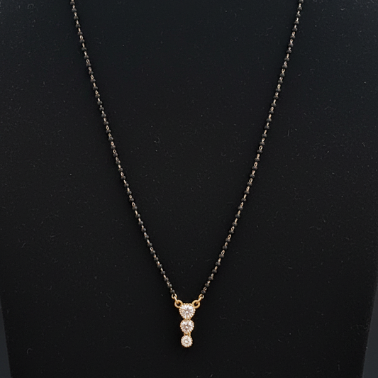 Necklace with a pendant on a red fabric background
