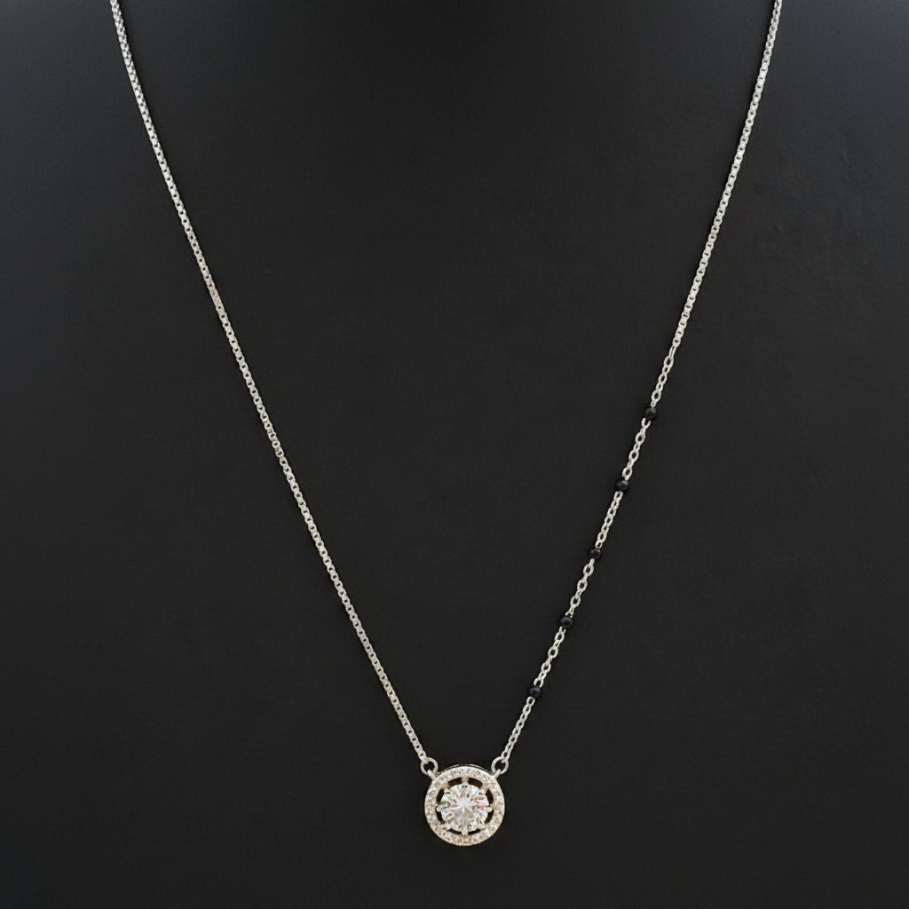 Gold necklace on a red garment