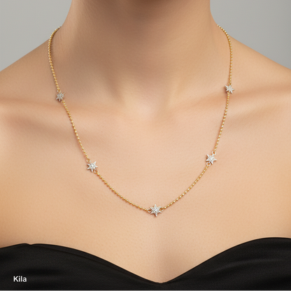 Necklace with star-shaped pendants on a model against a neutral background