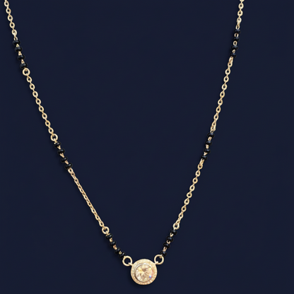 Necklace with a pendant on a red fabric background
