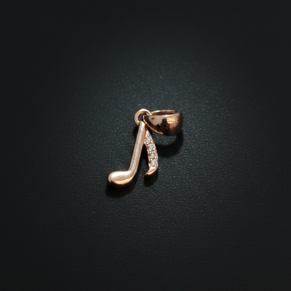 Rose gold earring on a person's ear